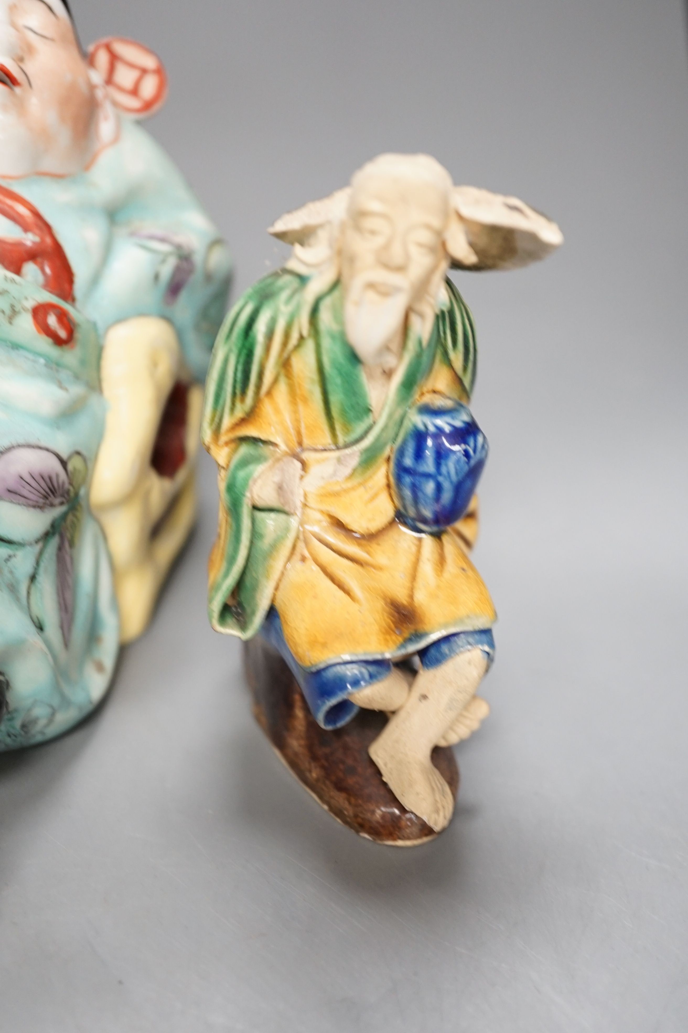 Five Chinese ceramic figures, saucers, etc., tallest 15cm. (18)